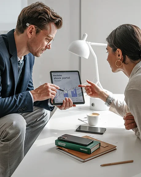image of man and woman checking analytics